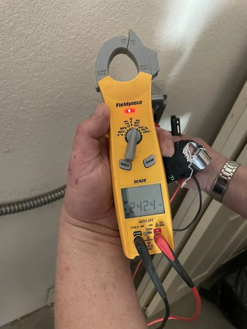 Voltage testing with clamp meter during Ceiling Fan Installation in Pompton Lakes